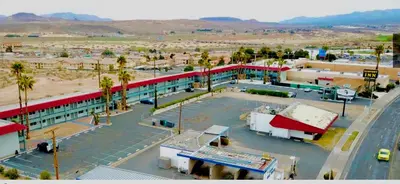 an overhead view of a building in a desert at Economy Inn Barstow in Barstow
