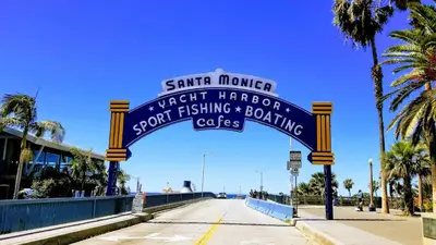 a sign for a seafood restaurant on the side of a road at Double Suite Santa Monica - Free Parking in Santa Monica