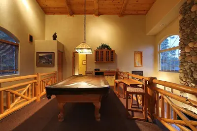 a room with a ping pong table in it at Summit Ski-Inn Ski-Out in Big Bear Lake