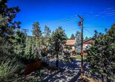 a view of a house from the street at Life of Riley-1608 by Big Bear Vacations in Big Bear Lake
