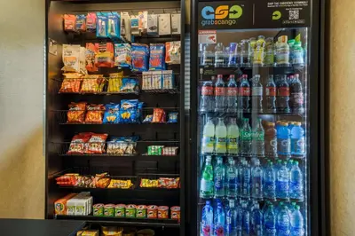 a refrigerator filled with lots of different types of drinks at Best Western Diamond Bar Hotel & Suites in Diamond Bar