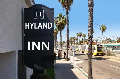 a sign for a hyundaiundai imn on a street at Hyland Inn Long Beach in Long Beach