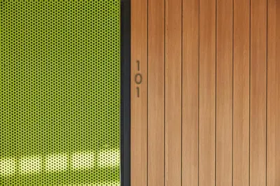 a close up of a building with a metal door at Mayumi in Los Angeles