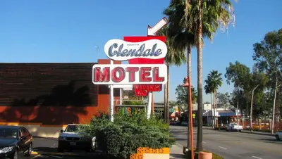 a sign for a motel on the side of a street at Motel 6 Glendale CA Pasadena Burbank Los Angeles in Glendale