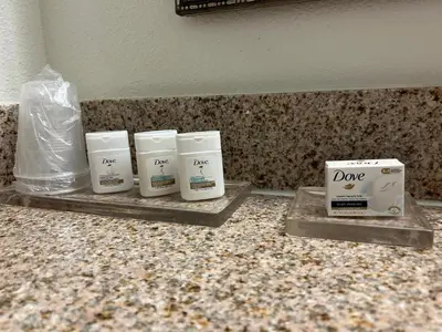 a group of three products sitting on a counter at Holiday Inn & Suites - Barstow by IHG in Barstow