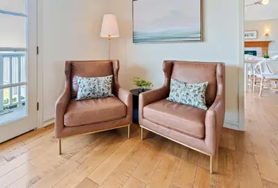two chairs sitting next to each other in a living room at Inn at Playa del Rey in Los Angeles
