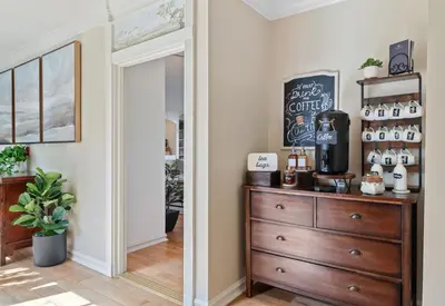 a room with a dresser with a coffee maker on it at Inn at Playa del Rey in Los Angeles