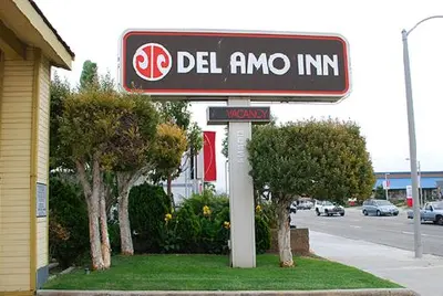 a sign for a del amo inn on a street at Del Amo Inn in Torrance
