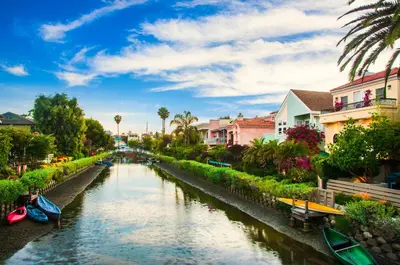 a river in a city with boats in it at Ocean Park Inn in Los Angeles