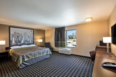 a hotel room with a bed and a desk at The Hotel 39 in Westminster