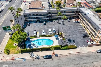 an overhead view of a building with a swimming pool at Vagabond Inn Whittier in Whittier