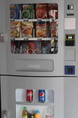 a refrigerator filled with lots of food and drinks at Valley Hotel in Rosemead