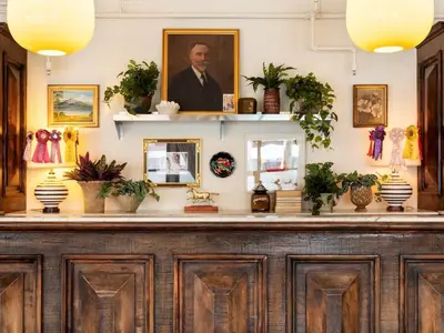 a bar with plants on top of it at Palihotel Melrose in Los Angeles