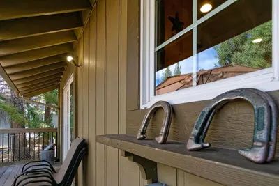 a kitchen counter with two sinks and a window at All About Fun-1149 by Big Bear Vacations in Big Bear Lake