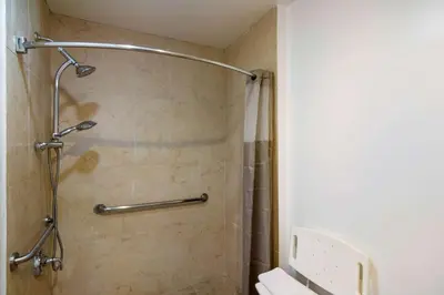 a shower in a bathroom with a shower curtain at Motel 6 Monterey Park in Monterey Park
