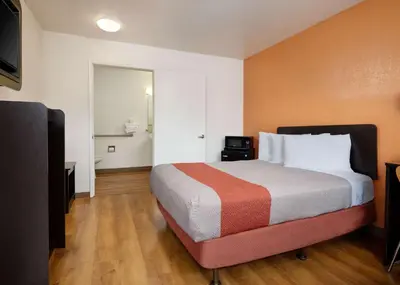 a hotel room with a bed and a television at Motel 6-Camarillo, CA in Camarillo