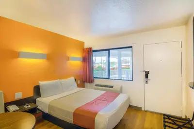 a hotel room with a bed and a window at Motel 6-Camarillo, CA in Camarillo