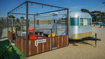 an rv is parked in a metal structure at Waypoint Ventura in Ventura