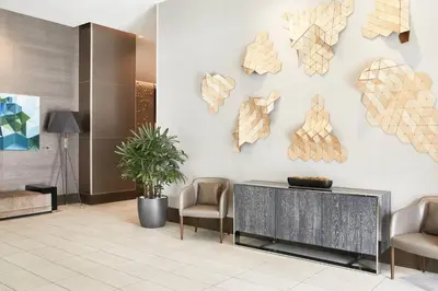 a lobby with wooden hearts on the wall at AC Hotel by Marriott Beverly Hills in Los Angeles