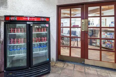 a soda machine in front of a store at Days Inn by Wyndham Castaic Six Flags Magic Mountain in Castaic