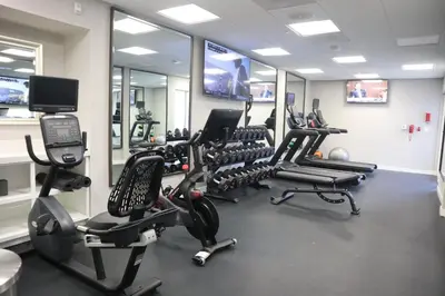 a gym with several treadmills and exercise bikes at Hilton Garden Inn Calabasas in Calabasas