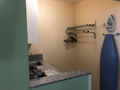 a kitchen with a sink and a counter top at Encore Motel Near Marina Del Rey, Culver City & Venice in Los Angeles