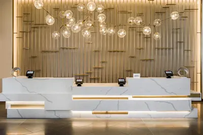 a table in a room with a chandelier at Delta Hotels by Marriott Ontario Airport in Ontario