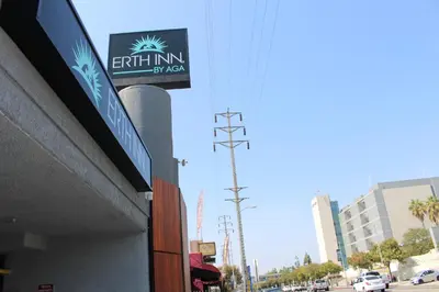 a sign on the side of a building at ERTH INN by AGA Los Angeles in Los Angeles