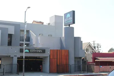 a building with a sign on the front of it at ERTH INN by AGA Los Angeles in Los Angeles