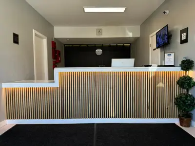 an office with a reception counter with aiger at Baymont by Wyndham Ridgecrest in Ridgecrest