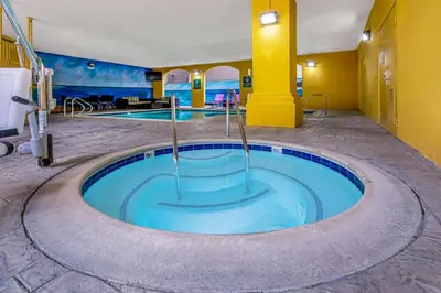 a hot tub in the middle of a hotel room at La Quinta by Wyndham Anaheim in Anaheim