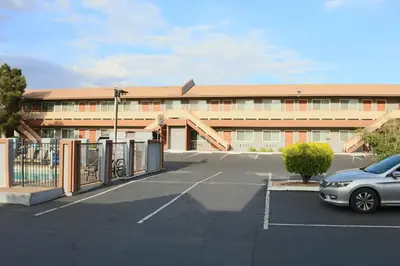 a parking lot in front of a building at Budget Inn On Historic Route 66, Barstow in Barstow