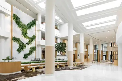 a rendering of a lobby with plants on the wall at The Westin Long Beach in Long Beach
