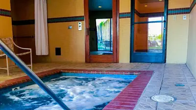 a hot tub in the middle of a room at Motel 6 - Anaheim Hills, CA in Anaheim