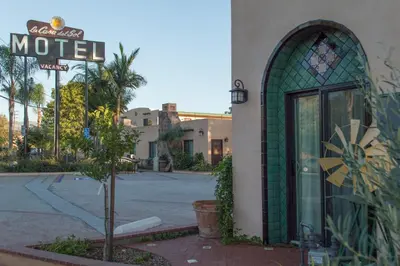 a motel sign on the side of a building at Casa Del Sol in Carpinteria