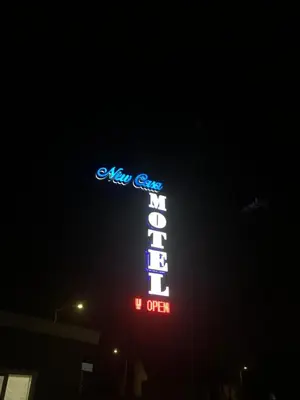 a lit up sign for a hotel at night at New Casa Motel Los Angeles in Los Angeles