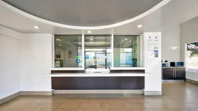 a lobby with a counter in a building at Motel 6 Victorville in Victorville