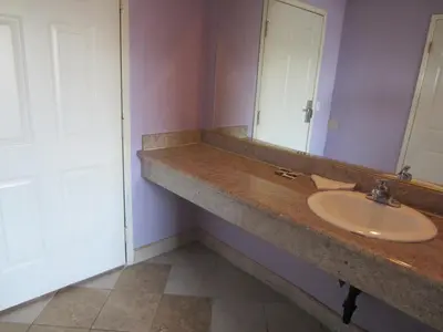 a bathroom with a sink and a mirror at Starlight Inn, Valley Blvd - Downtown LA in Los Angeles