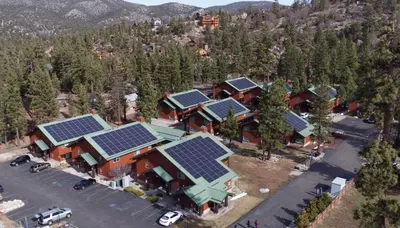 an aerial view of a house with solar panels on it at WorldMark Big Bear Lake in Big Bear Lake