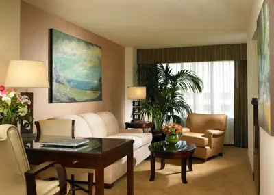 a living room with a couch and a table at DoubleTree Suites By Hilton Anaheim Resort/Convention Center in Anaheim