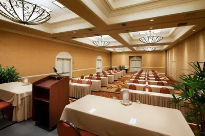 a large room with tables and chairs in it at DoubleTree Suites By Hilton Anaheim Resort/Convention Center in Anaheim