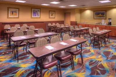 a classroom with tables and chairs in a room at Hampton Inn & Suites Ontario in Ontario