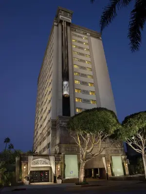 a tall building with trees in front of it at Huntley Santa Monica Beach in Los Angeles