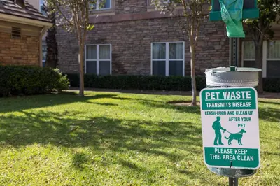 a pet waste sign in front of a house at Homewood Suites by Hilton Ontario Rancho Cucamonga in Rancho Cucamonga