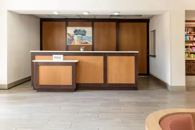 a lobby with a reception desk and a counter at Homewood Suites by Hilton Ontario Rancho Cucamonga in Rancho Cucamonga