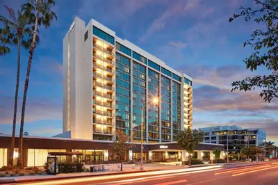 a rendering of the office building at dusk at Hilton Pasadena in Pasadena