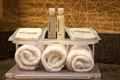 a shelf with towels and other products on it at Holiday Inn Express Port Hueneme by IHG in Port Hueneme