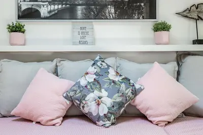 a bunch of pillows sitting on top of a couch at Charming 1-Bedroom Home near Downtown Culver in Los Angeles
