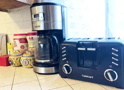a coffeemaker sitting next to a coffee maker on a counter at Cozy Suite near City of hope in Duarte