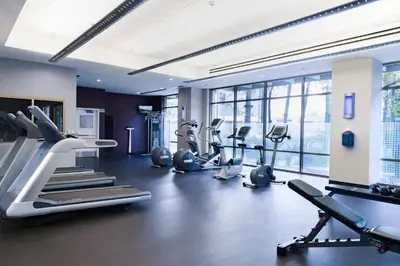 a gym with treadmills and elliptical machines at WorldMark Anaheim in Anaheim